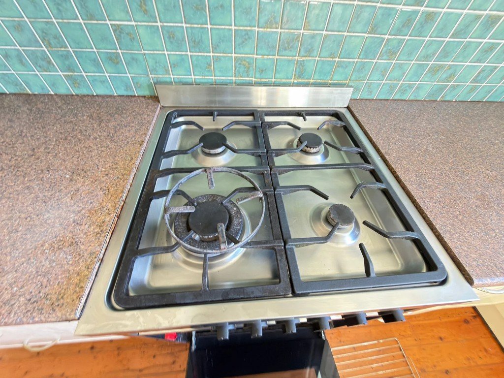 Polished stainless steel gas stovetop