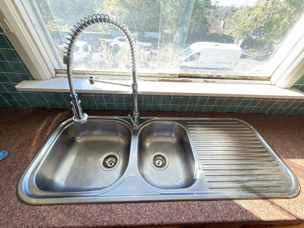 Sparkling stainless steel kitchen sink